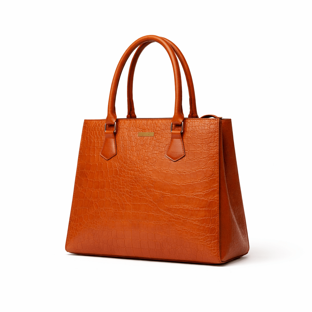 Brown crocodile-embossed leather tote bag displayed from the right side on a pure white background
